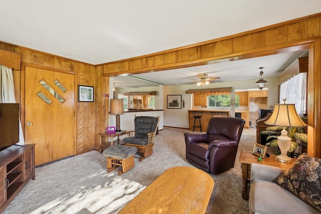 183 Long Hollow Rd, Rock Spring, GA 39736 - living room with wooden walls, carpet flooring, and ceiling fan