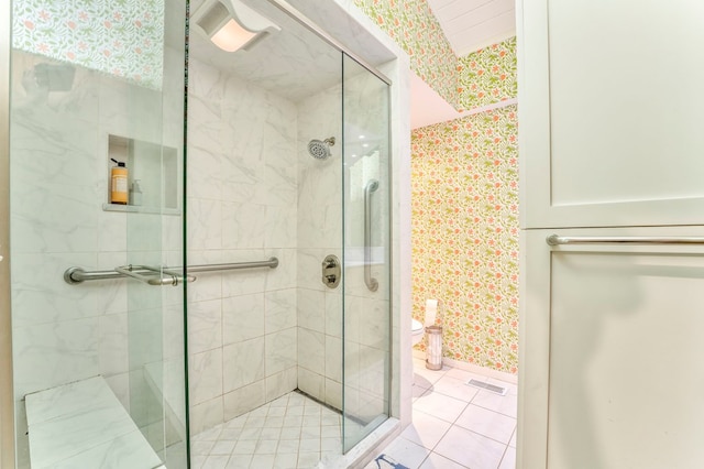 1301 Morton Dr, Dalton, GA 30720 - full bathroom featuring wallpapered walls, a stall shower, tile patterned floors, and baseboards