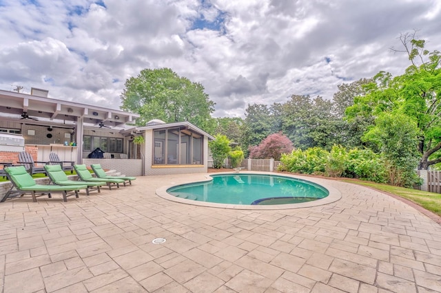1301 Morton Dr, Dalton, GA 30720 - view of swimming pool with a sunroom, a patio, ceiling fan, and fence
