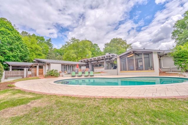 1301 Morton Dr, Dalton, GA 30720 - swimming pool featuring a sunroom, a patio area, and ceiling fan