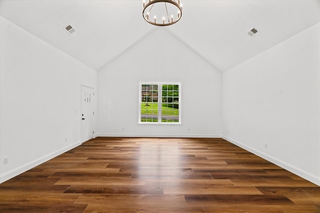 3005 Crystal Mark Ln, Dalton, GA 30721 - empty room featuring a chandelier, wood finished floors, and vaulted ceiling