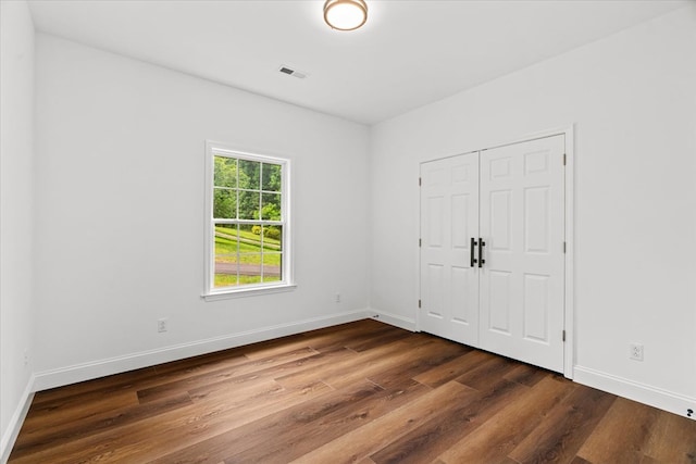 3005 Crystal Mark Ln, Dalton, GA 30721 - unfurnished bedroom with wood finished floors and a closet