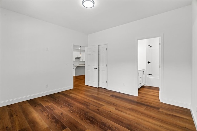 3005 Crystal Mark Ln, Dalton, GA 30721 - unfurnished bedroom with dark wood-type flooring, ensuite bathroom, and a closet