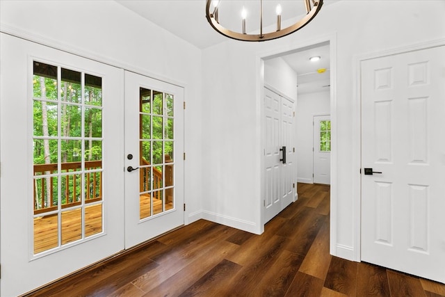 3005 Crystal Mark Ln, Dalton, GA 30721 - entryway featuring dark wood-style floors, french doors, and a chandelier