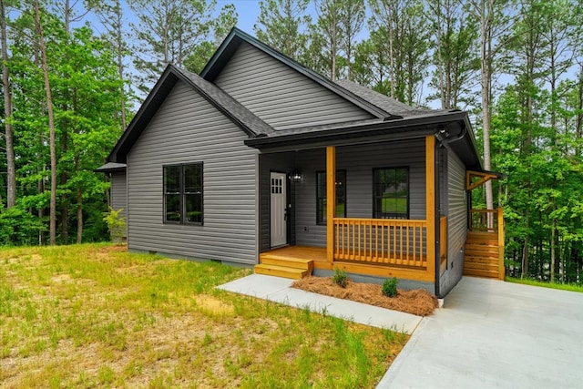 3005 Crystal Mark Ln, Dalton, GA 30721 - view of front of house with a porch, crawl space, and roof with shingles