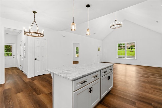 3005 Crystal Mark Ln, Dalton, GA 30721 - kitchen featuring a chandelier, healthy amount of natural light, dark wood-style flooring, and lofted ceiling