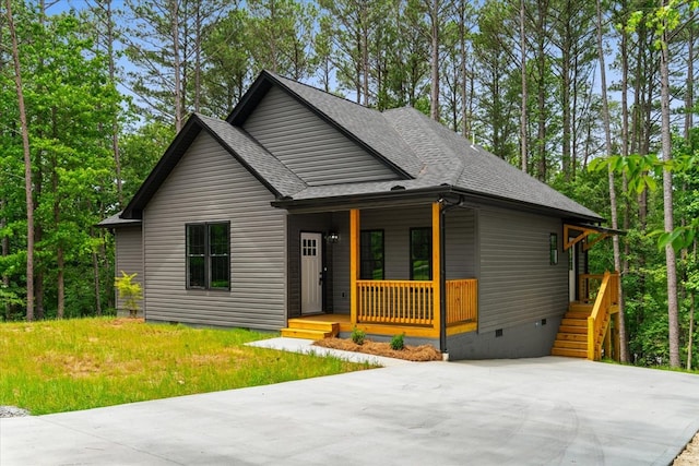 3005 Crystal Mark Ln, Dalton, GA 30721 - view of front facade featuring crawl space, covered porch, and roof with shingles