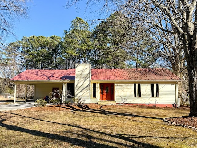 single story home with a carport and a front lawn