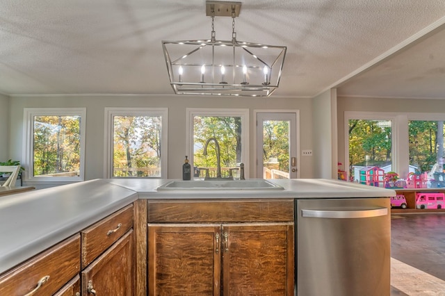 432 Castle Rd, Dalton, GA 30720 - kitchen with sink, crown molding, a textured ceiling, decorative light fixtures, and stainless steel dishwasher