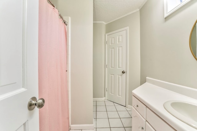 432 Castle Rd, Dalton, GA 30720 - bathroom with crown molding, tile patterned floors, a textured ceiling, and vanity