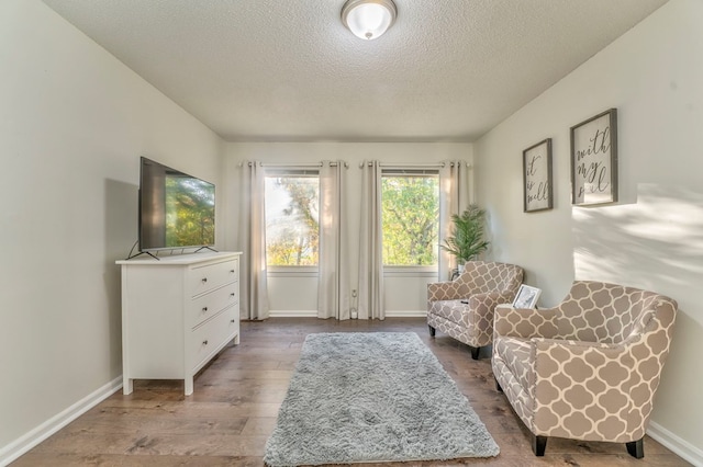 432 Castle Rd, Dalton, GA 30720 - living area with hardwood / wood-style flooring and a textured ceiling