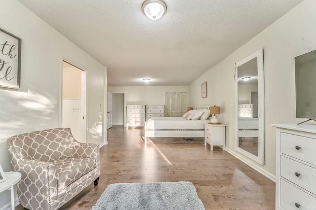 432 Castle Rd, Dalton, GA 30720 - bedroom featuring hardwood / wood-style floors and a textured ceiling
