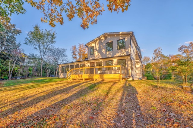432 Castle Rd, Dalton, GA 30720 - view of front of house featuring a wooden deck, a sunroom, and a front yard
