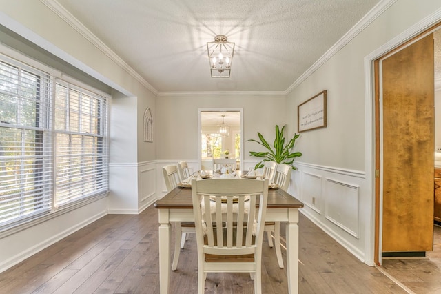 432 Castle Rd, Dalton, GA 30720 - dining room with an inviting chandelier, hardwood / wood-style floors, and a textured ceiling