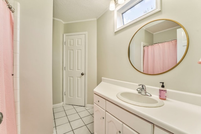 432 Castle Rd, Dalton, GA 30720 - bathroom featuring tile patterned flooring, ornamental molding, vanity, and a textured ceiling