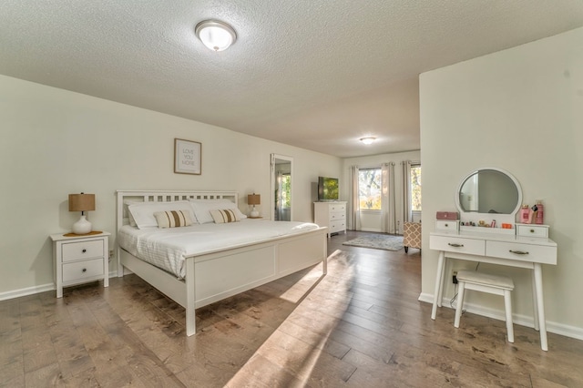 432 Castle Rd, Dalton, GA 30720 - bedroom featuring wood-type flooring and a textured ceiling