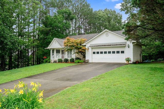 103 Paddle Wheel Ct, Cohutta, GA 30720 - ranch-style house with driveway, a porch, a front lawn, and a garage