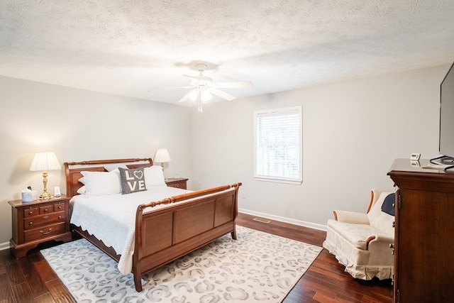 103 Paddle Wheel Ct, Cohutta, GA 30720 - bedroom with wood finished floors, baseboards, a textured ceiling, and a ceiling fan