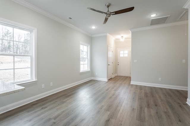 191 Andros Dr, Dalton, GA 30721 - empty room with a ceiling fan, ornamental molding, wood finished floors, baseboards, and recessed lighting