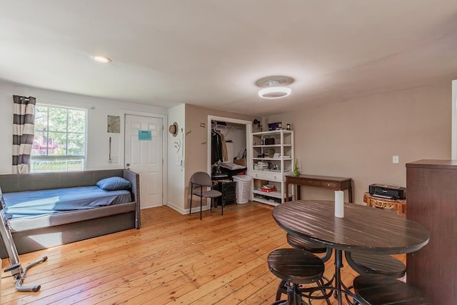 dining space with light wood-type flooring