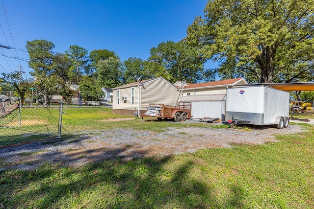 rear view of house with a lawn