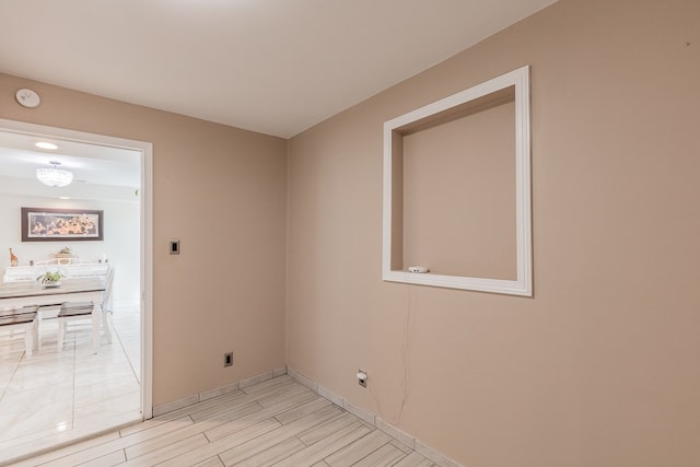 unfurnished room featuring light hardwood / wood-style flooring