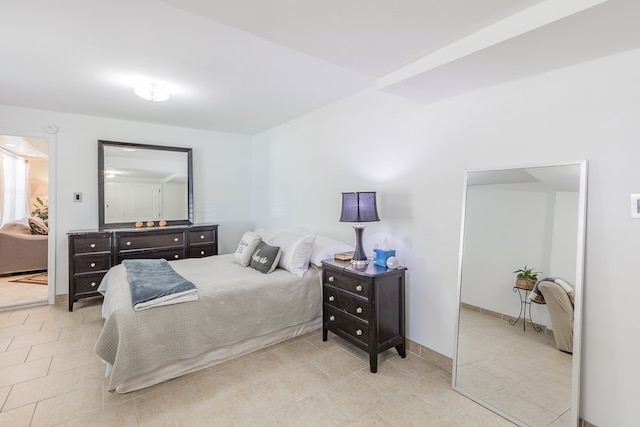 bedroom with light tile patterned flooring