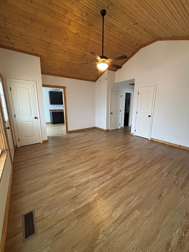 unfurnished living room featuring wood ceiling, ceiling fan, wood-type flooring, and high vaulted ceiling