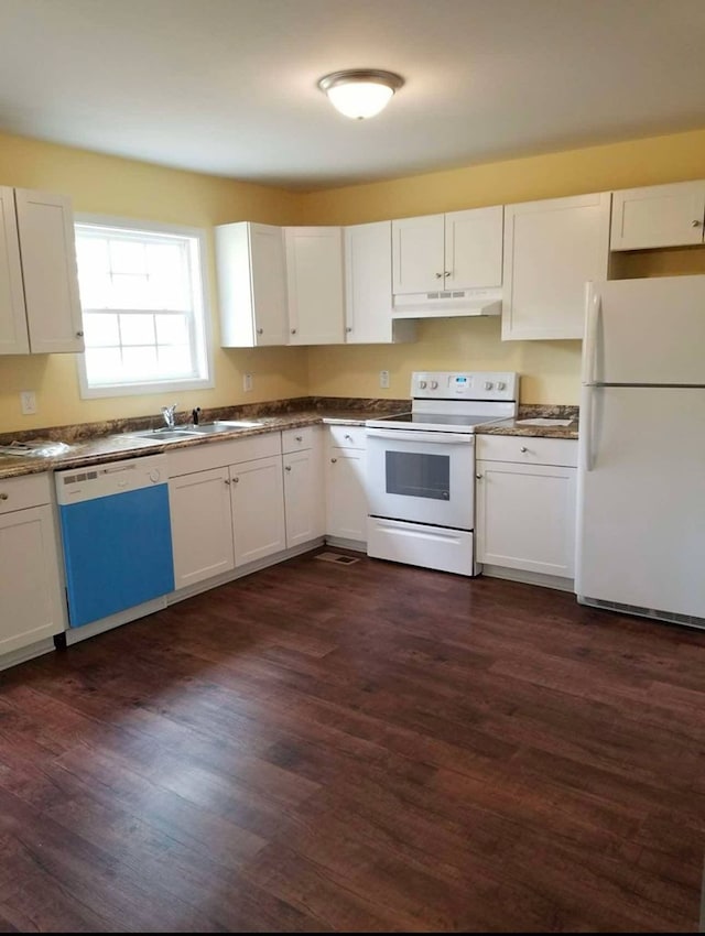 825 Martin Luther King Jr Blvd, Dalton, GA 30721 - kitchen with white appliances, under cabinet range hood, dark wood-style flooring, and white cabinetry