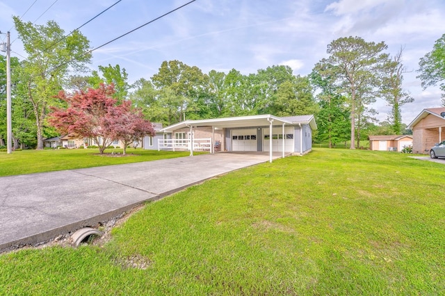 1164 Holly Grove Cir, Dalton, GA 30720 - view of front of house featuring a garage, a front lawn, a carport, and driveway