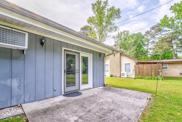 1164 Holly Grove Cir, Dalton, GA 30720 - exterior space featuring a lawn, fence, a patio, and board and batten siding