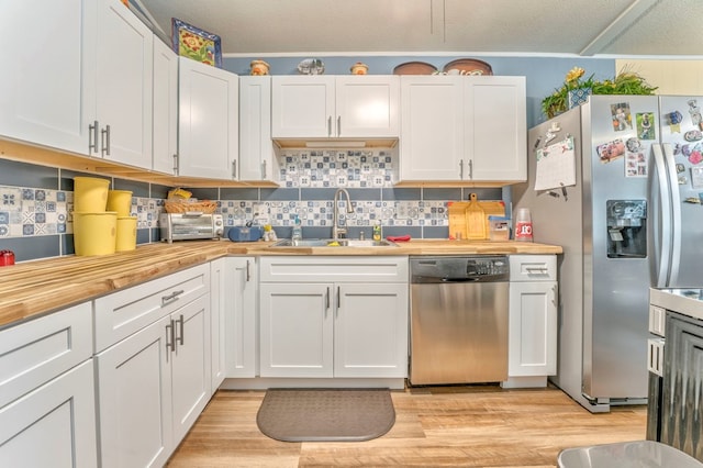 1164 Holly Grove Cir, Dalton, GA 30720 - kitchen with wood counters, white cabinetry, stainless steel appliances, and a sink