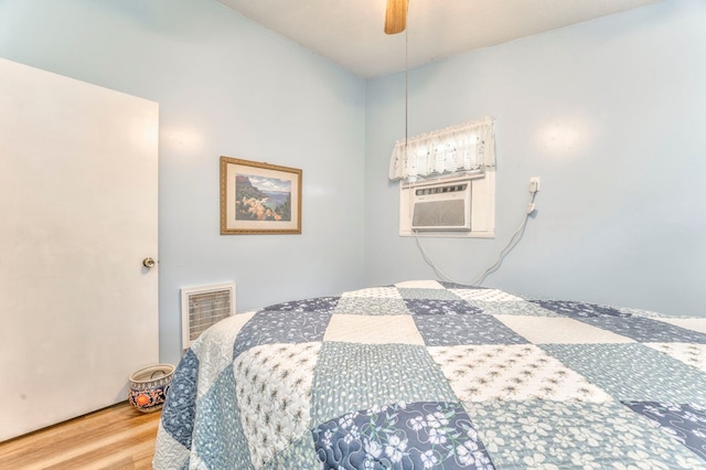 1164 Holly Grove Cir, Dalton, GA 30720 - bedroom with a ceiling fan, visible vents, and wood finished floors