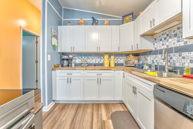 1164 Holly Grove Cir, Dalton, GA 30720 - kitchen with wooden counters, a sink, light wood-type flooring, stainless steel dishwasher, and vaulted ceiling