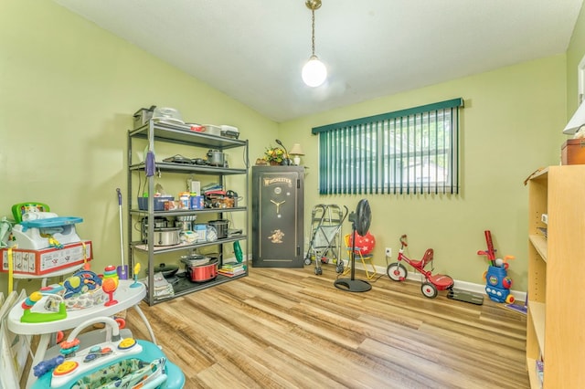 1164 Holly Grove Cir, Dalton, GA 30720 - game room with lofted ceiling and wood finished floors