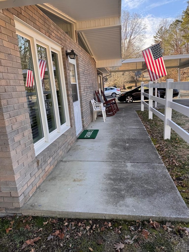 view of patio / terrace featuring fence