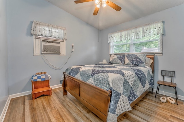 1164 Holly Grove Cir, Dalton, GA 30720 - bedroom with vaulted ceiling, baseboards, and wood finished floors