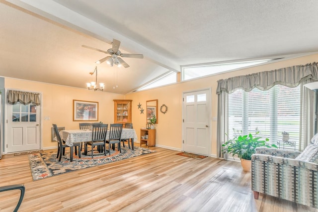 1164 Holly Grove Cir, Dalton, GA 30720 - entryway featuring light wood finished floors, a textured ceiling, lofted ceiling with beams, and ceiling fan with notable chandelier