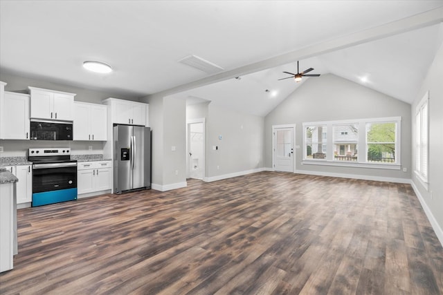 kitchen with dark hardwood / wood-style flooring, light stone countertops, white cabinets, and appliances with stainless steel finishes