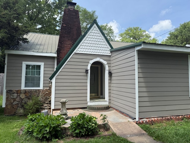406 Lester Ave, Dalton, GA 30721 - view of front of property featuring a chimney and metal roof