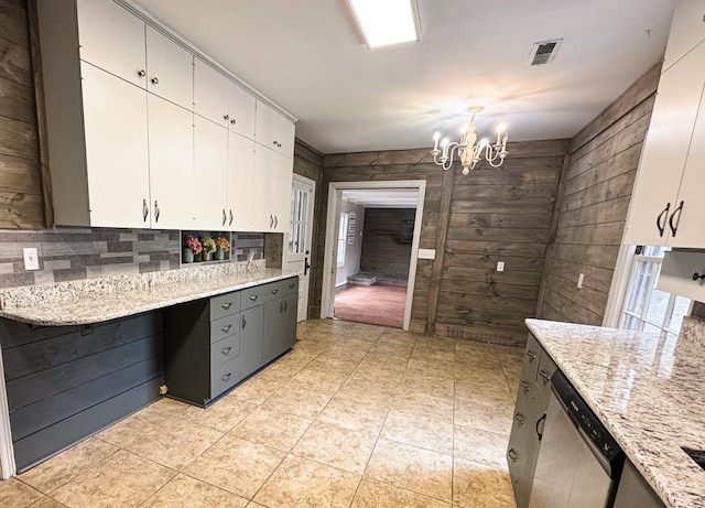 282 Cedar Ridge Rd, Dalton, GA 30721 - kitchen with wood walls, a chandelier, visible vents, dishwasher, and white cabinets