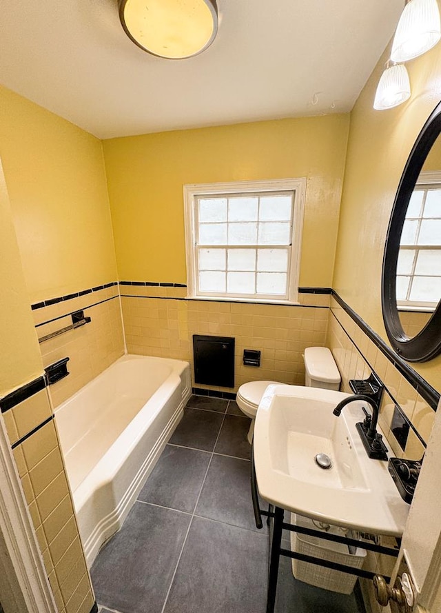 282 Cedar Ridge Rd, Dalton, GA 30721 - full bath featuring a bath, tile walls, toilet, tile patterned floors, and a healthy amount of sunlight
