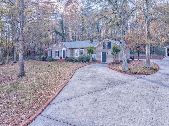 282 Cedar Ridge Rd, Dalton, GA 30721 - ranch-style house featuring a chimney and concrete driveway