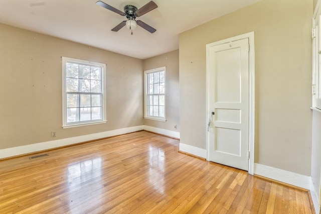 282 Cedar Ridge Rd, Dalton, GA 30721 - unfurnished room featuring baseboards, visible vents, ceiling fan, and light wood-type flooring