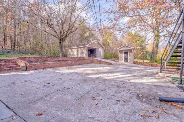 282 Cedar Ridge Rd, Dalton, GA 30721 - view of outbuilding featuring an outdoor structure and stairway