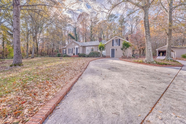 282 Cedar Ridge Rd, Dalton, GA 30721 - ranch-style house featuring driveway and a chimney