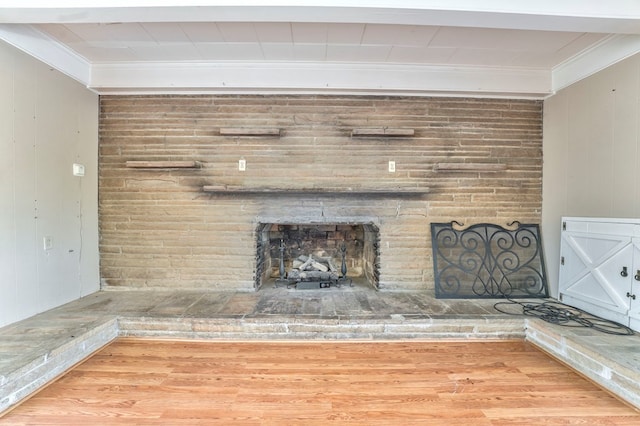 282 Cedar Ridge Rd, Dalton, GA 30721 - interior details featuring wood finished floors, ornamental molding, and a brick fireplace