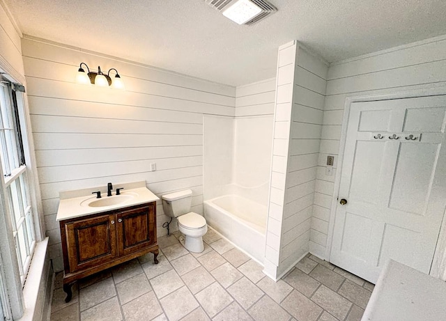 282 Cedar Ridge Rd, Dalton, GA 30721 - full bath with a textured ceiling, visible vents, wood walls, toilet, and vanity