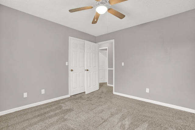 478 Dedmon Rd, Ringgold, GA 30736 - unfurnished bedroom with carpet floors and a ceiling fan