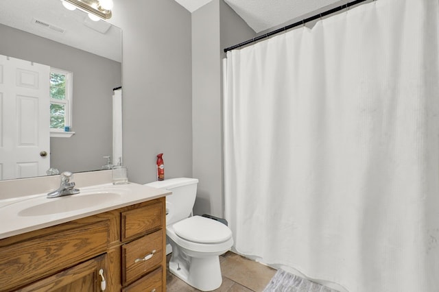 478 Dedmon Rd, Ringgold, GA 30736 - full bath featuring tile patterned floors, vanity, and a textured ceiling
